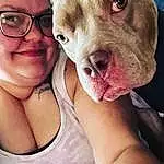 Nose, Skin, Glasses, Smile, Dog, Green, Vision Care, Jaw, Neck, Carnivore, Happy, Liver, Fawn, Working Animal, Dog breed, Companion dog, Selfie, Eyewear, Chest