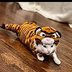 Bengal Tiger, Siberian Tiger, Tiger, Toy, Carnivore, Small To Medium-sized Cats, Felidae, Wood, Whiskers, Fawn, Terrestrial Animal, Big Cats, Tail, Snout, Hardwood, Stuffed Toy, Furry friends, Cat